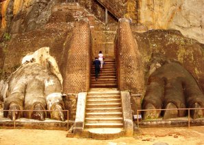Mysterious giant carved feet ascending towards summit of Sigiriya Rock, Sri Lanka
