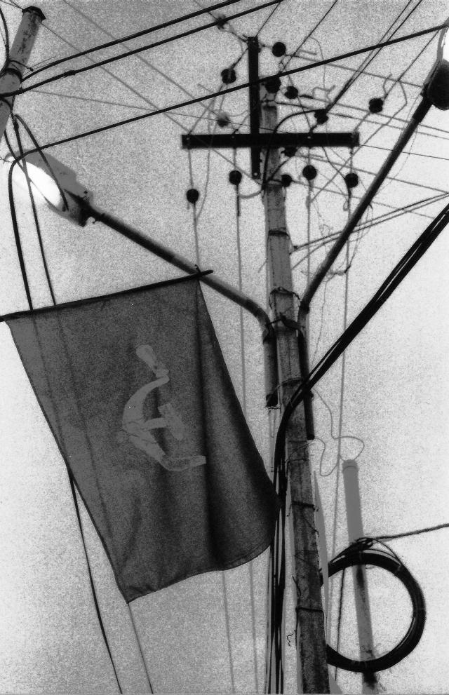 The hammer sickle hangs from a telegraph pole in Cochin, India